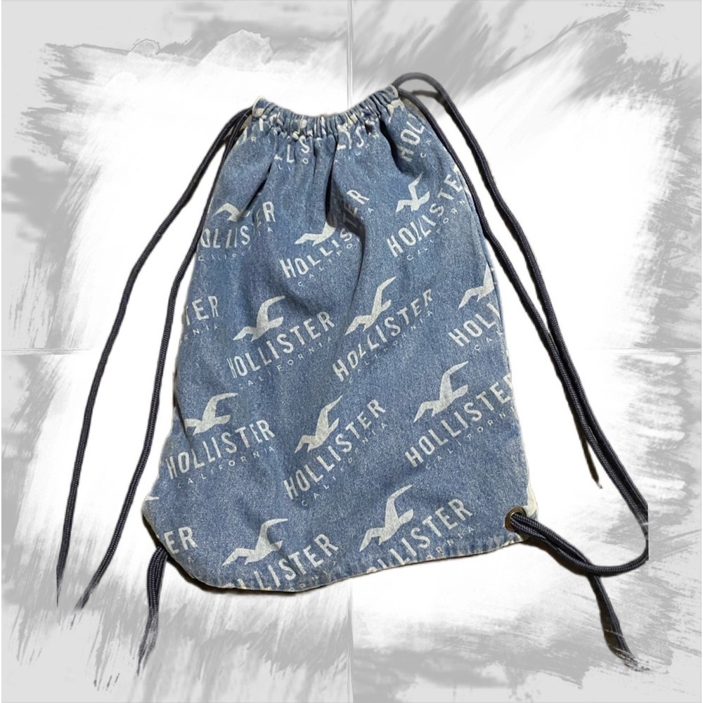 Drawstring denim hollister sling back pack